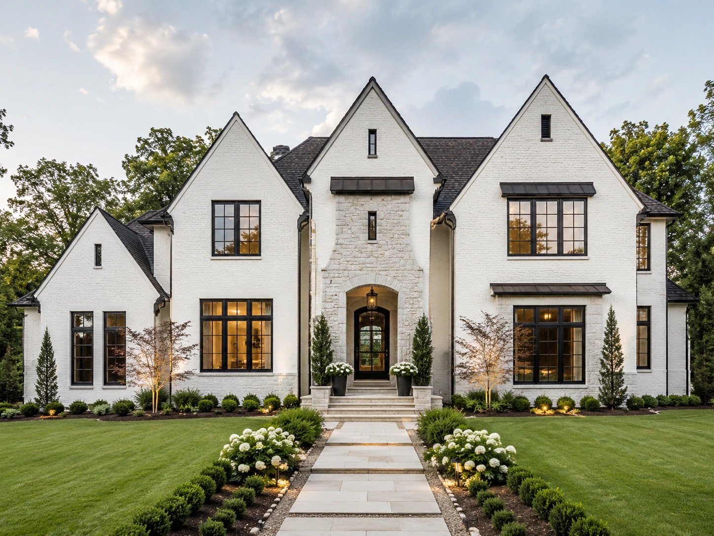 Original exterior photograph of an elegant white gabled home