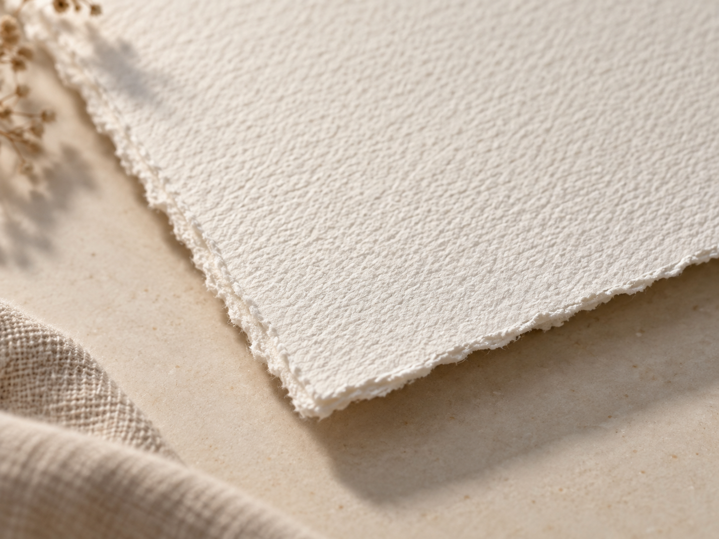 Close-up of cold press fine art paper texture and deckled corner
